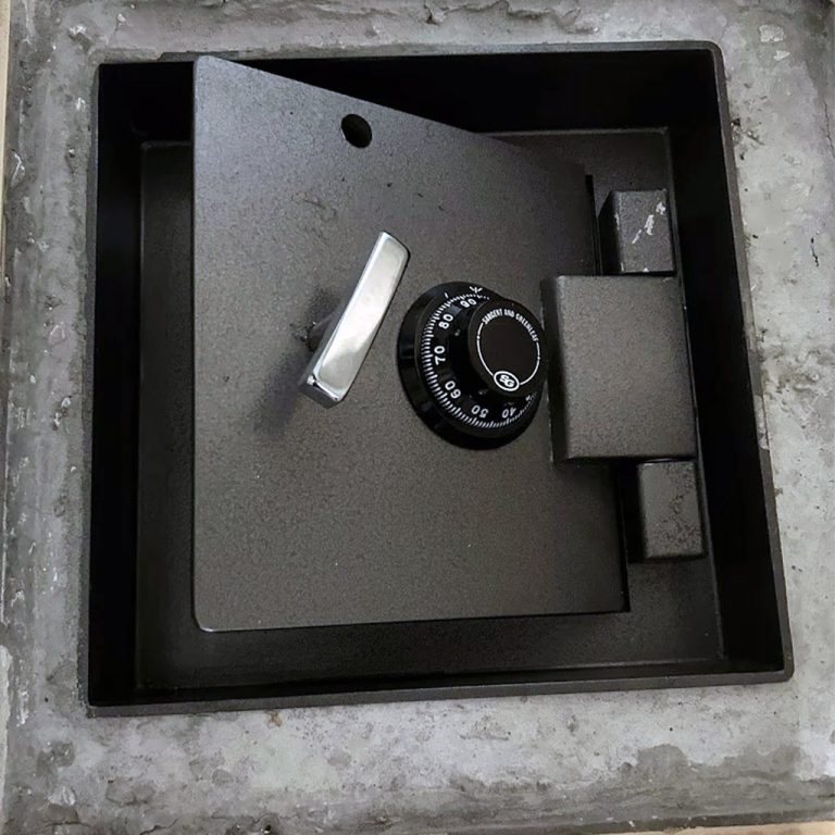 Floor-mounted combination safe partially opened during a locksmith service in Panama City Beach, FL
