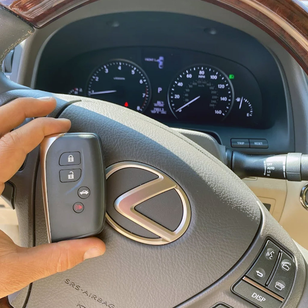 Lexus key fob programming on steering wheel by automotive locksmith in Panama City Beach