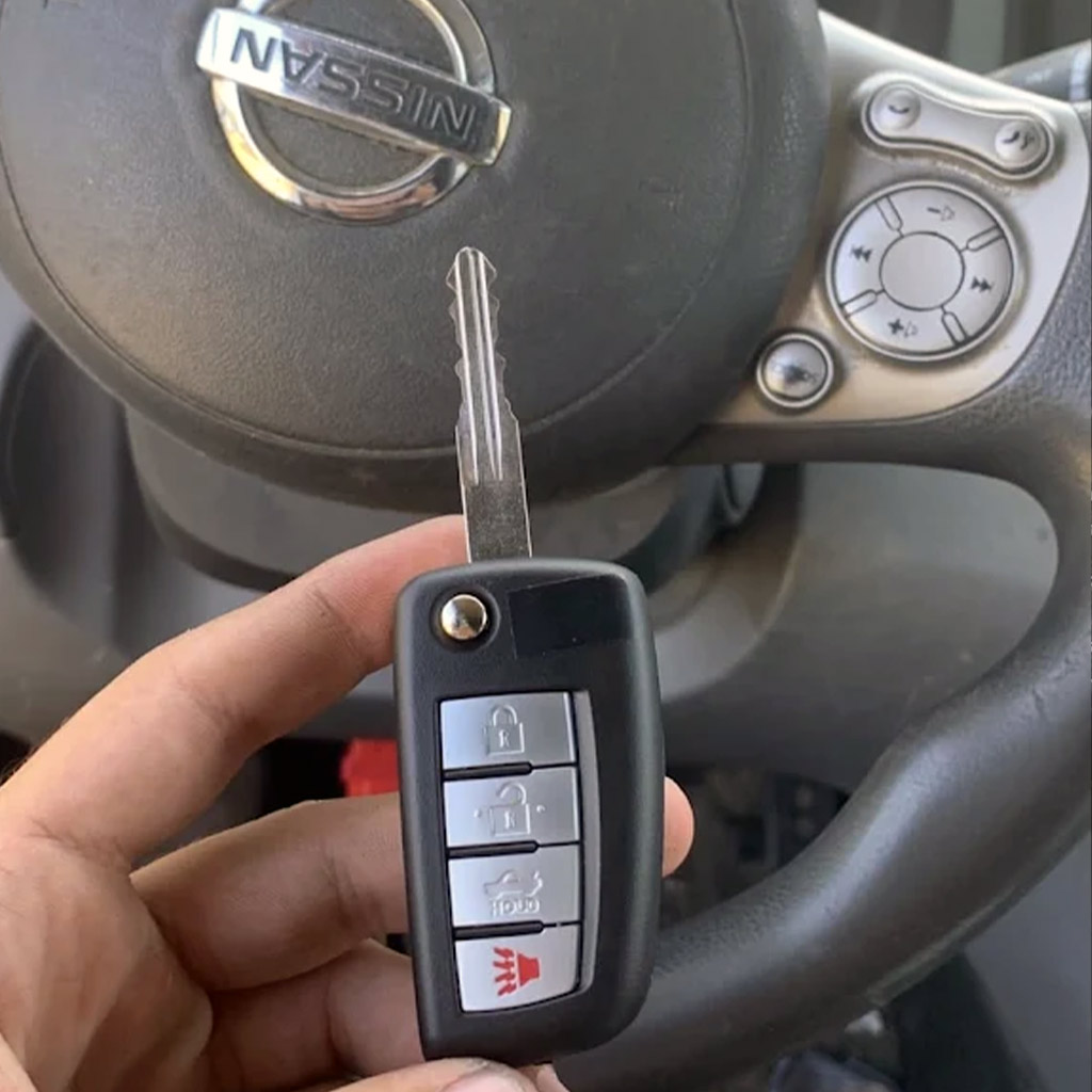 Nissan car key replacement shown inside the vehicle in Panama City Beach.